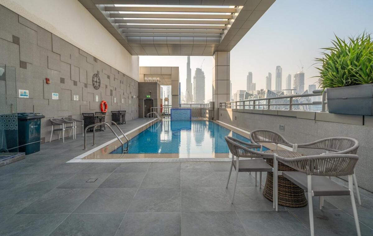 1br 5-star W & Infinity Pool & Gym Canal Views Bahay bakasyunan Dubai